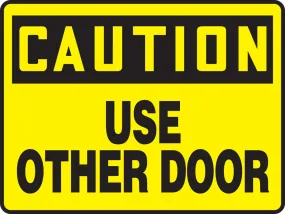 Accuform® 10" X 14" Black And Yellow Aluminum Safety Signs "CAUTION USE OTHER DOOR"