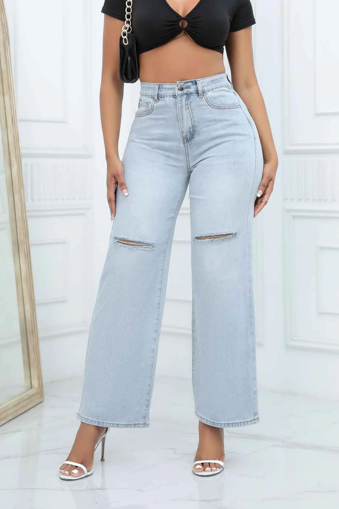 Ripped Mid Rise Flared Jeans