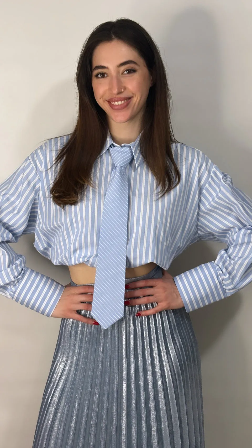 Striped shirt with elastic band on the hem