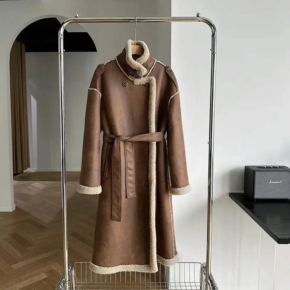 Winter luxury: a long faux leather coat lined with real shearling for maximum warmth and style