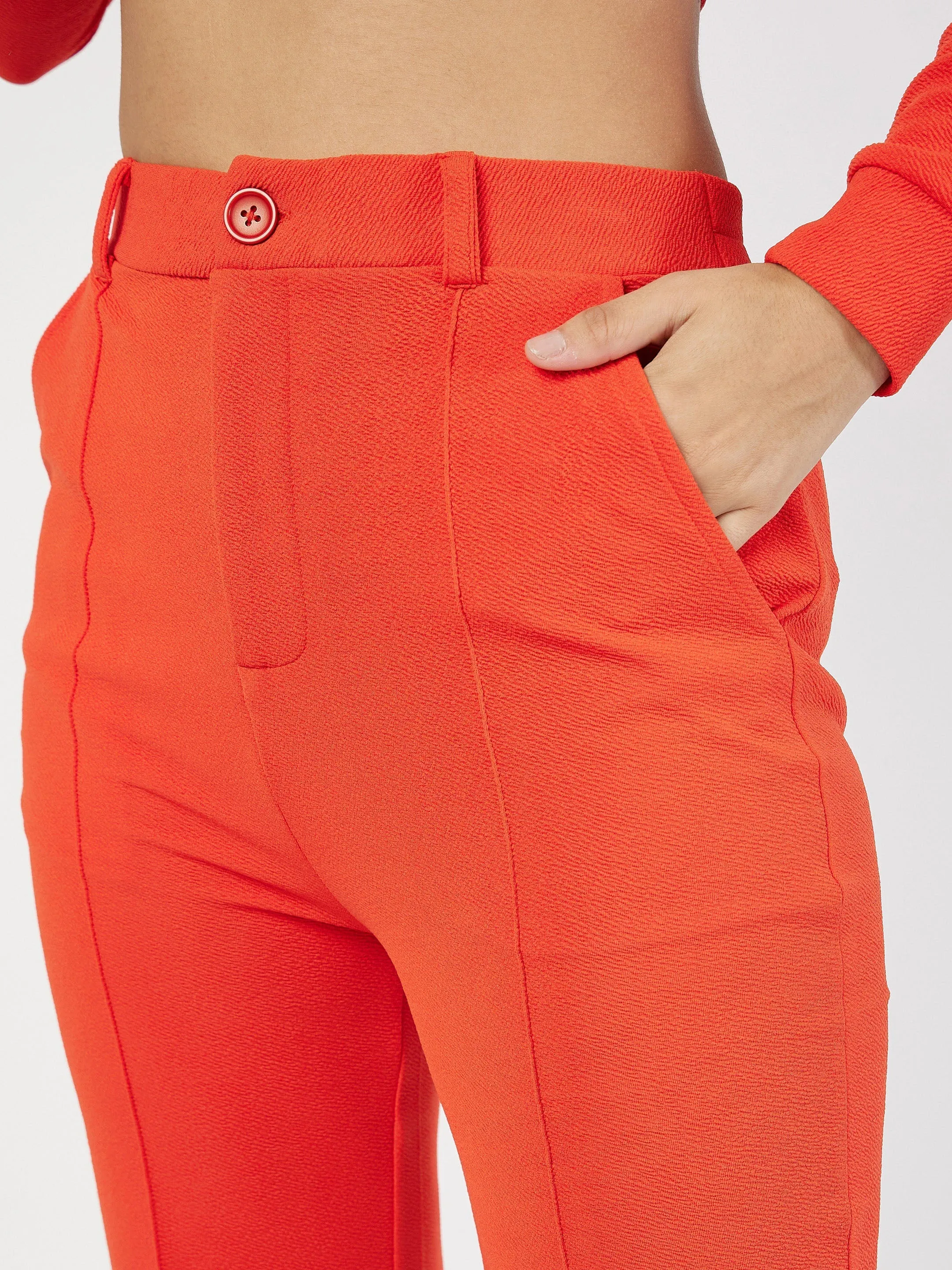 Women Orange Wrap Peplum Top With Bellbottom Pants